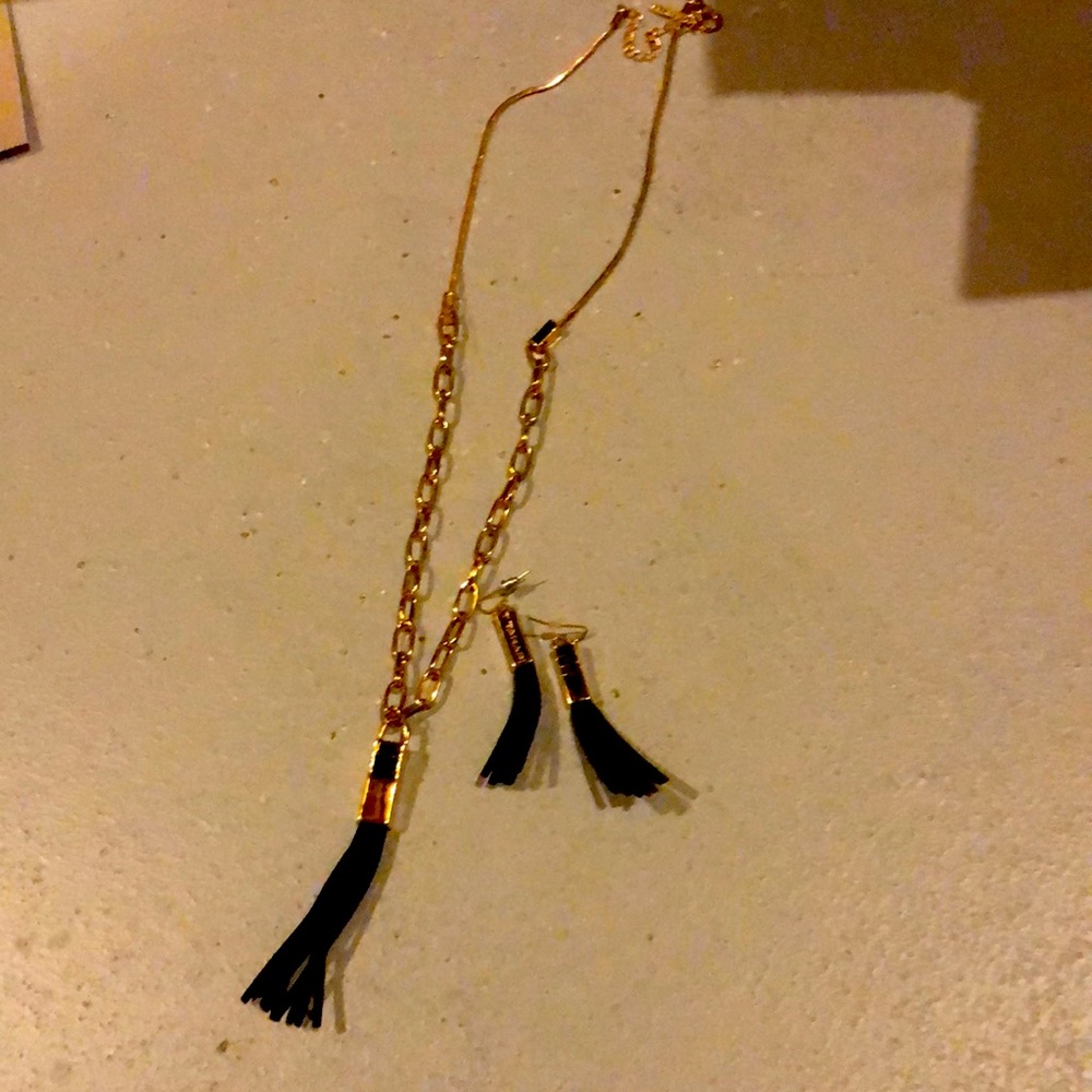 Black and gold necklace with matching earrings